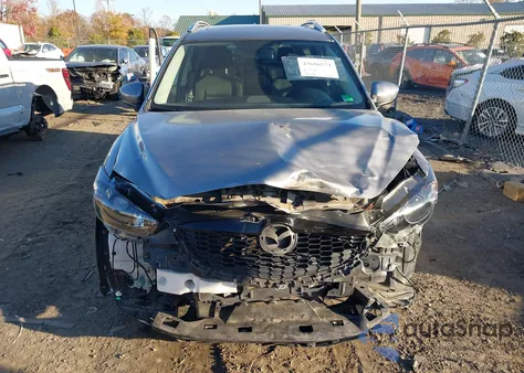 2014 Mazda Cx-5 Touring z USA, uszkodzony, nr VIN JM3KE4CY3E0393283